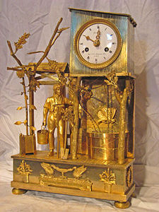 KIRTLAND H. CRUMP - fine brass french mantel clock with unusual butter - Desk Clock